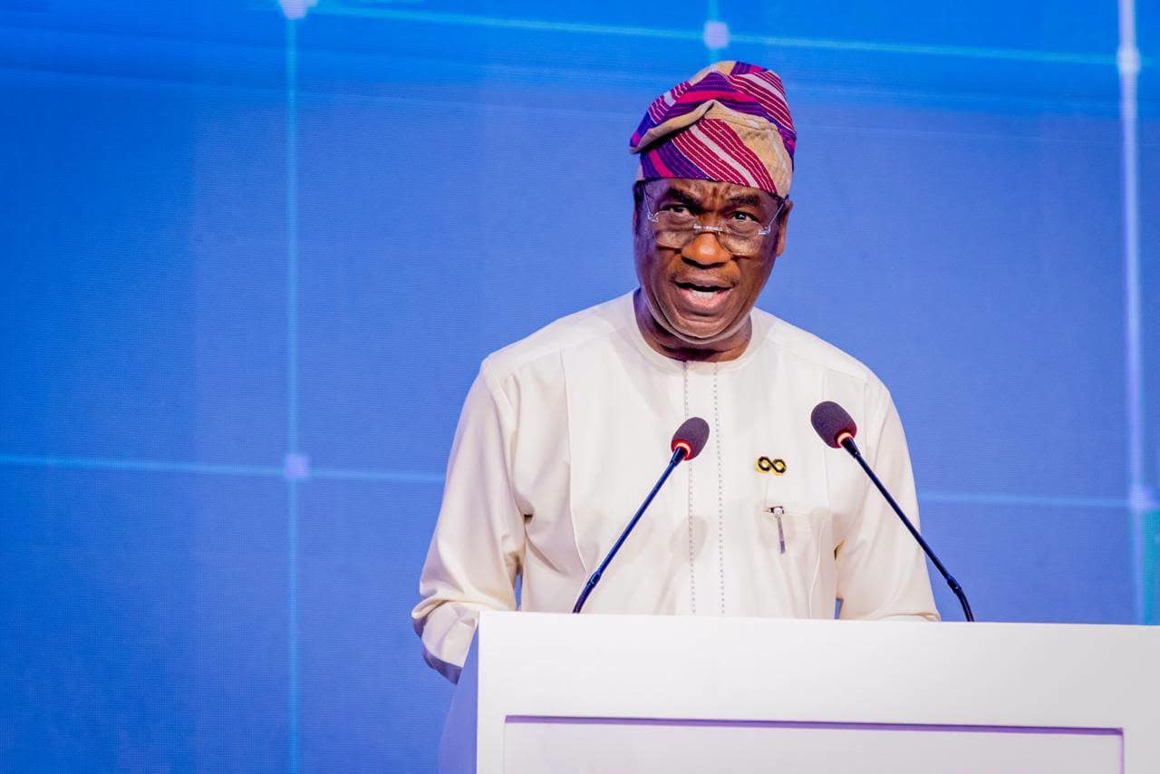 Lagos Deputy Governor Dr Obafemi Hamzat speaking at a podium.