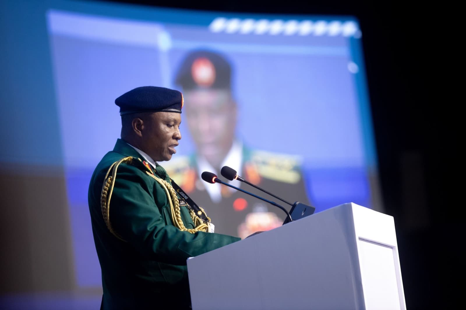 DICON's Director General, Maj Gen Ibrahim Babatunde Alaya, speaking at the AFRIDEX 2026 podium.